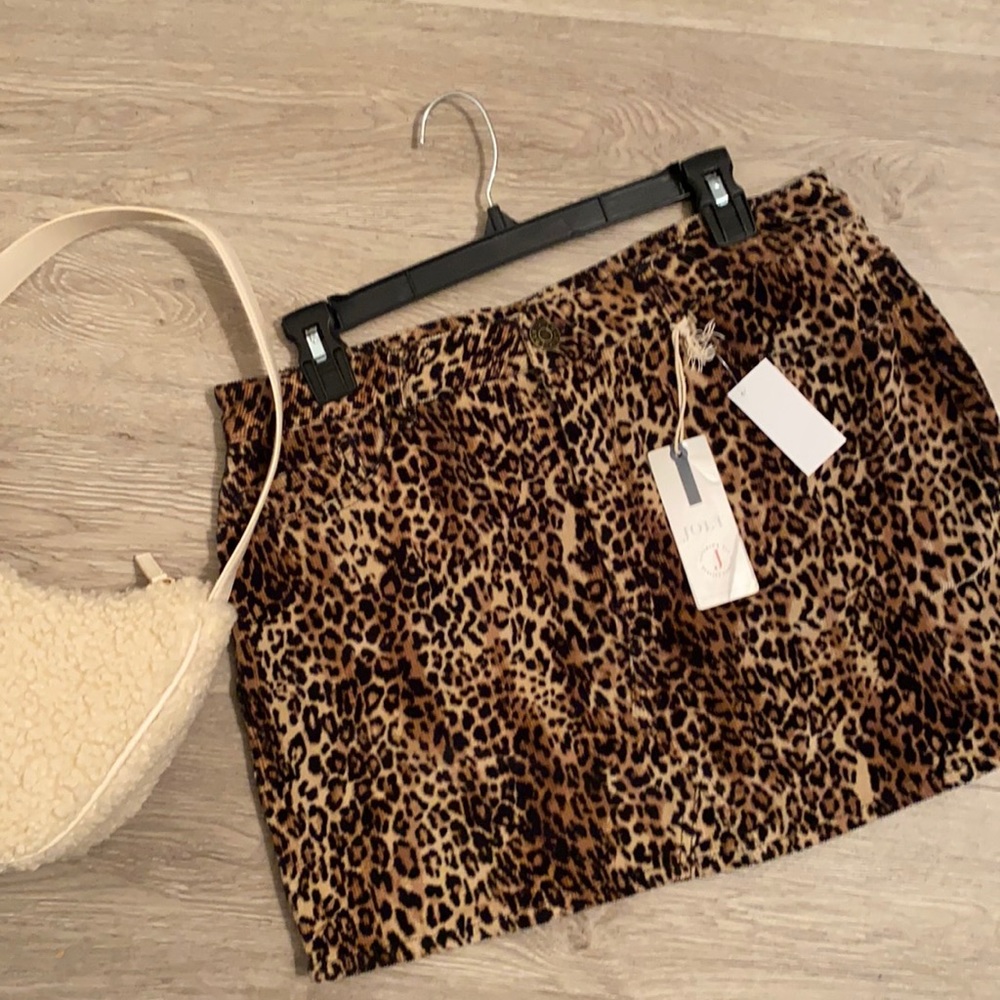 New animal print skirt with tags. Size 13.